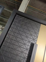 Porte en aluminium moulé simple et élégante, porte double de villa, portail de sécurité anti-effraction de style néo-chinois pour maison individuelle.