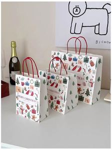 Sacs en papier kraft de Noël recyclables avec logo personnalisé, poignées torsadées, imprimés offset, sacs cadeaux et sacs shopping blancs - Product Image 2