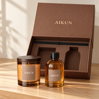 Ensemble diffuseur de parfum et bougie parfumée AIKUN en verre ambré de luxe avec logo personnalisé et bâtonnets aromatiques noirs pour la décoration de la maison