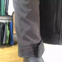 Barato al por mayor venta caliente Negro hombres chaqueta softshell tela