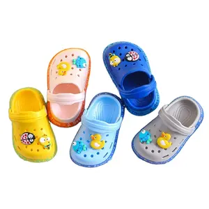 Fábrica lindo bebé Sandalias Niño zapatilla niña suave niños pequeños diapositivas agujero zapato PVC playa jardín ZAPATOS BARATOS niños zuecos niños