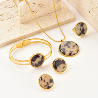 Ensemble de bijoux en acier inoxydable pour femme : collier, bracelet, boucles d'oreilles et bague, style léopard vintage et élégant