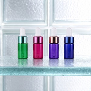 Flacon compte-gouttes en verre cylindrique avec bouchon coloré, emballage cosmétique vide, vente en gros, OEM, logo personnalisé, fournisseur en vrac - Product Image 1