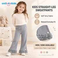 Pantalon évasé personnalisé Smiledotkids pour enfants, gris côtelé, ourlet à volants, taille élastique, OEM ODM, vente en gros pour petites filles