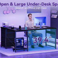 Bureau d'angle en L noir pour ordinateur, avec prises électriques intégrées et étagères réversibles, idéal pour la maison, le bureau, la chambre ou le salon, parfait pour le gaming.