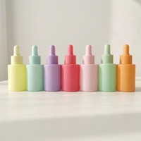 Cylindre givré de haute qualité sérum d'huile essentielle personnalisé cosmétique 1oz flacon compte-gouttes en verre rose 30ml avec boîte en papier