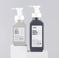 Flacon pompe en plastique PET design tendance à épaule oblique pour savon moussant et crème visage 280ml 400ml 600ml