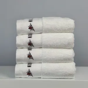 Asciugamano standard hotel a 5 stelle di lusso in cotone 100% terry con logo bianco spa asciugamano per adulti asciugamano per mani