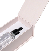 Boîtes cosmétiques uniques personnalisées, flacon compte-gouttes en verre d'huile essentielle de 30 ml, emballage en boîte en papier avec logo en relief