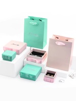 Emballage personnalisé de bijoux Jinsky de luxe Boîtes à bagues roses pour colliers en papier avec nœud en ruban