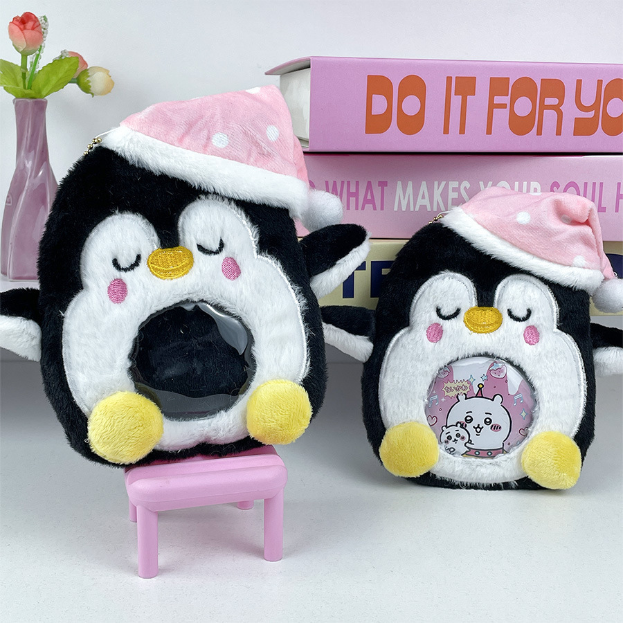 Sleeping penguin card holder