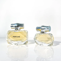Flacon de parfum portable en verre transparent à fond épais unique avec pompe pulvérisatrice 30ml 80ml, impression sérigraphique, couleurs personnalisées, service OEM ODM