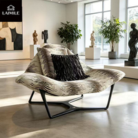Fauteuil lounge moderne en tissu imprimé léopard, structure en métal doré, sans accoudoirs, fauteuil d'appoint individuel pour salon de villa