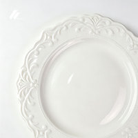 Service de table en porcelaine blanche à motif floral en relief, style vintage français, assiettes et bols en céramique, personnalisation du logo, vente en gros