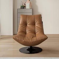 Fauteuil de salon design italien sans accoudoirs, pivotant et rembourré, avec base sur piédestal, pour villa, salon ou hôtel