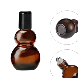 Botellas de Vidrio Ámbar Redondas de 30 ml y 50 ml con Forma de Calabaza para Perfume, con Bolas de Rodillo de Acero Inoxidable, 1 oz 50 ml - Product Image 4
