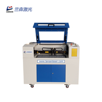Machine de gravure et de découpe tout-en-un laser à fibre CO2 pour bois acrylique plastique cuir PVC verre tissu pierre acier inoxydable MDF