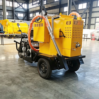 Machine de scellement de fissures routières robuste et durable avec revêtement résistant pour le comblement des joints de routes par les agents routiers