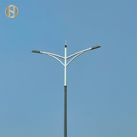 Poste de luz de calle galvanizado por inmersión en caliente FUTAO Poste de luz de calle solar con integración de múltiples funciones