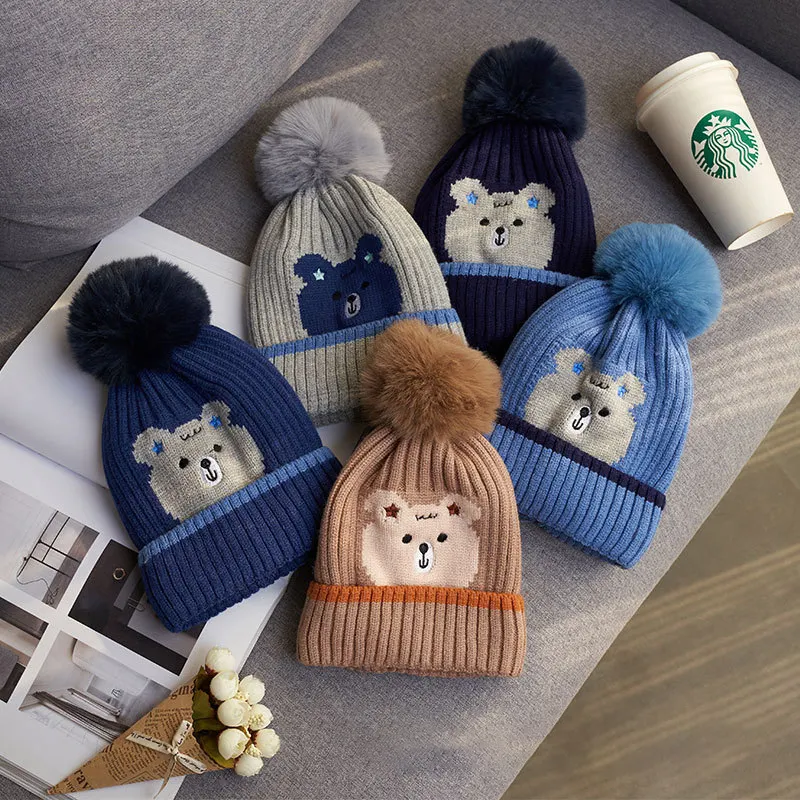 Nieuwste Kinderen Winter Unisex Pompom Cap Schattige Cartoon Warme String Kinderen Gebreide Muts