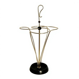 Porte-parapluie moderne en métal artisanal, finition thermolaquée, structure autoportante, décoration abstraite pour la maison, double face - Product Image 1