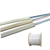 Venta al por mayor Cable de fibra óptica PBT con 1/2/4 Core G657A1/G657A2 FTTH Cable de tubo suelto central Cables de comunicación