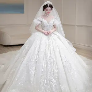 2829新设计2024奢华新娘贴花结婚派对礼服大尾一字肩户外婚纱