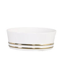 Lavabo rond en céramique de luxe moderne avec lignes dorées, vasque à poser en porcelaine pour projet hôtelier