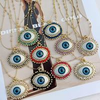 Coeur coloré yeux bleus collier à breloques coeur charme oeil chanceux perle or perles chaîne collier bijoux en gros