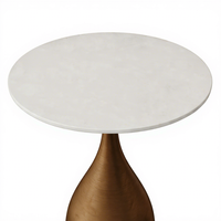Table d'appoint de luxe à surface ronde en marbre et base en acier, style italien minimaliste et élégant pour villa