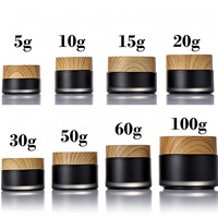Pot cosmétique rond en verre noir mat rechargeable avec couvercle en bois, disponible en 5g, 10g, 15g, 20g, 30g, 50g, 60g, 100g, 200g, idéal pour crème visage.