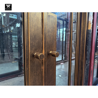 Porte française moderne en laiton verre acier pour villas grilles forgées à la main Portes extérieures doubles en fer forgé design