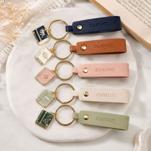 Porte-clés personnalisé en cuir PU pour amoureux avec breloque en métal émaillé rigide en forme de livre floral, logo gravé, cadeau élégant - Product Image 1