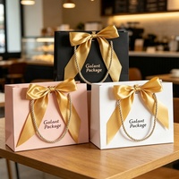 Luxury Paperboard Gift Bag with Gold Edge Recycled Materials Portable Jewelry Wedding Gift Packaging with Bow Ribbon