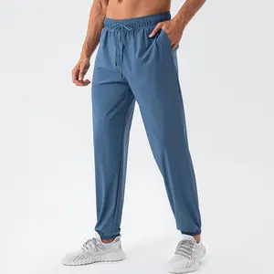 Pantalones deportivos holgados de nailon para hombre, pantalones deportivos elásticos de secado rápido para exteriores, pantalones deportivos recreativos para correr