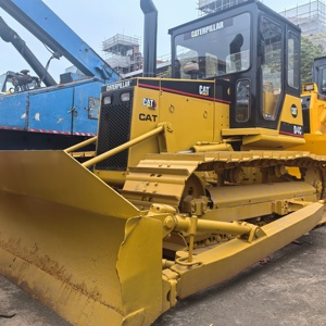 รถตักล้อยางแคตเตอร์พิลลาร์ รุ่น D4C พร้อมใบมีดและรางตีนตะขาบ สีเหลือง อุปกรณ์ก่อสร้าง น้ำหนักบรรทุก 7 ตัน กำลัง 60 กิโลวัตต์ - Product Image 5