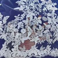 Tissu en dentelle brodée de sequins et de strass de luxe avec motif floral pour robes de mariée et décorations