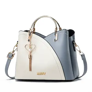 Bolso de mujer personalizado, bolso de hombro de piel sintética para mujer, Asa de metal de color contrastante, bolsos de moda para mujer, bolsos de mano para mujer