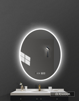 Miroir de salle de bain d'hôtel ovale moderne et élégant avec éclairage LED, horloge, affichage de la température et fonctions d'induction