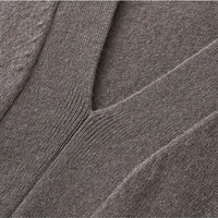 Robe en laine à col en V personnalisée et élégante pour femmes silhouette droite et mince robe longue en cachemire tricotée à motif solide pour l'automne
