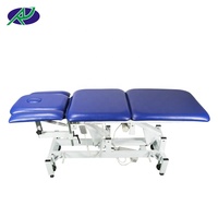 Table de massage réglable, lit de physiothérapie électrique, épreuve pour clinique, offre spéciale