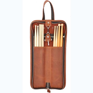 Échantillon gratuit Sac de rangement pour baguettes en cuir PU avec logo personnalisé Étui de protection anti-poussière portable et durable pour instruments de musique - Product Image 1