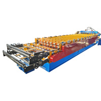 Machine de formage à froid de tôles galvanisées à double couche pour toitures