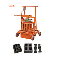 Petite machine manuelle de fabrication de briques en blocs de ciment en béton à vendre en Ouganda pour la ponte des œufs 2-45