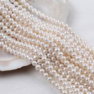 Perles d'eau douce blanches presque rondes de 6-7 mm en gros de Zhuji, perles naturelles semi-finies pour le bricolage - Product Image 2