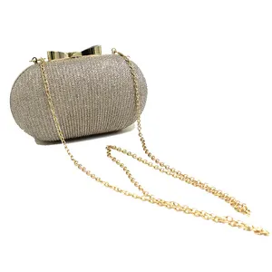 Bolso de mano dorado con cadena y lazo de Metal para mujer, bandolera brillante para boda