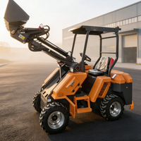 Chargeuse compacte sur chenilles diesel Kubota polyvalente avec accessoire chariot élévateur pour la manutention de matériaux en entrepôt