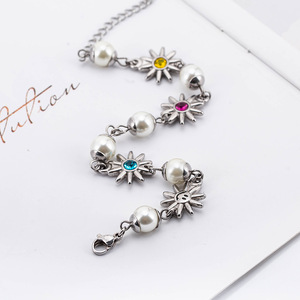 yunnique Pulsera de acero de titanio con perlas de girasol y incrustaciones de cristal, joyería unisex - Product Image 4