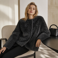 Manteau mi-long vintage en laine et cuir pour femme, noir et gris chiné, col rond, garniture en peau de mouton, veste décontractée d'hiver