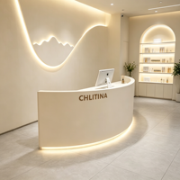 Comptoir de réception incurvé pour salon de beauté, comptoir moderne avec éclairage LED, table de réception de spa avec logo personnalisé
